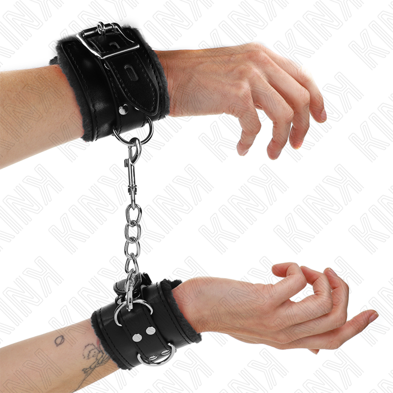 KINK - FUR LINED WRIST RESTRAINTS BLACK WITH BLACK BELT ADJUSTABLE 17-29 CM X 6 CM - NOCTURNA DESIRES