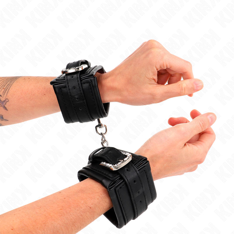 KINK - RHINESTONE BUCKLE WRIST RESTRAINTS BLACK ADJUSTABLE 25-32 CM X 5.5 CM - NOCTURNA DESIRES