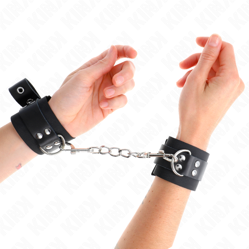 KINK - NYLON WRIST RESTRAINTS BLACK WITH LEATHER BELT BLACK ADJUSTABLE 19-29 CM X 5.1 CM - NOCTURNA DESIRES
