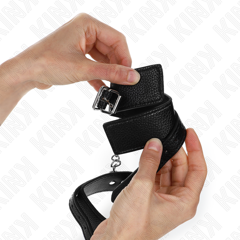 KINK - SNAKE PATTERN WRIST RESTRAINTS BLACK ADJUSTABLE 20-28 CM X 5.4 CM - NOCTURNA DESIRES