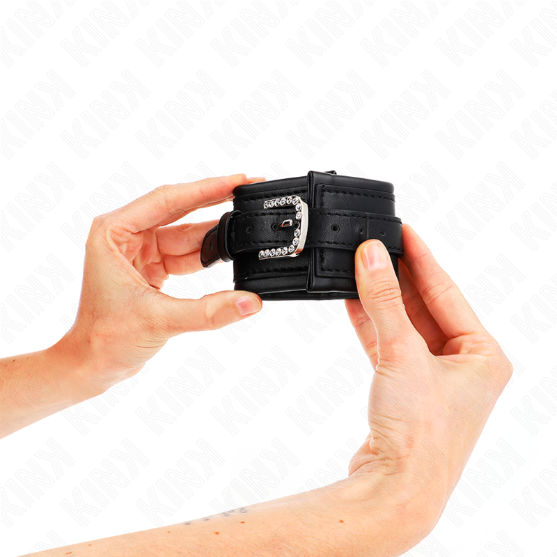 KINK - RHINESTONE BUCKLE WRIST RESTRAINTS BLACK ADJUSTABLE 25-32 CM X 5.5 CM - NOCTURNA DESIRES