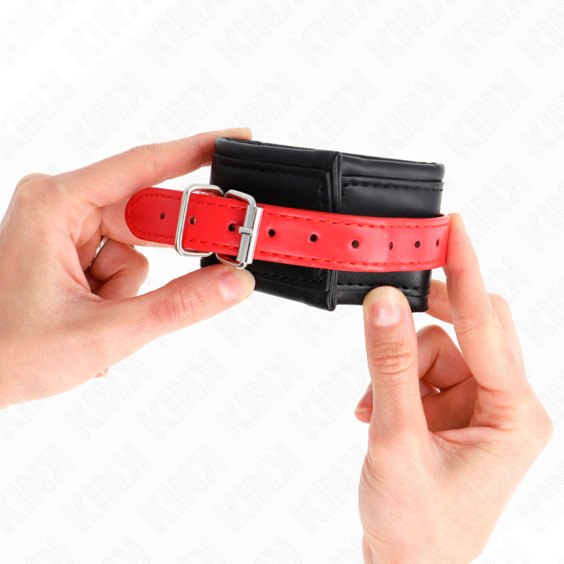 KINK - WRIST RESTRAINTS BLACK WITH RED BELT ADJUSTABLE 17-28 CM X 6 CM - NOCTURNA DESIRES